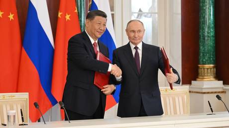 President of Russia Vladimir Putin and President of China Xi Jinping during a ceremony of exchanging documents after Russia-China talks on May 8, 2025.