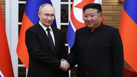 FILE PHOTO: Russian President Vladimir Putin and North Korean leader Kim Jong Un.