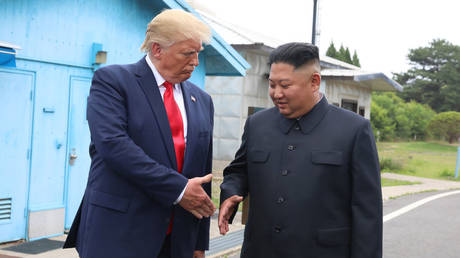 US President Donald Trump and North Korean leader Kim Jong-un meet on June 30, 2019 @ Dong-A Ilbo via Getty Images