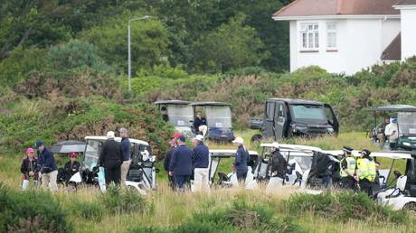 A general view of US President Donald Trump's entourage as he plays golf at Trump Turnberry golf course on July 26, 2025 in Turnberry, Scotland.
