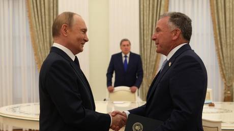 FILE PHOTO. Russian President Vladimir Putin and US Special envoy Steve Witkoff.