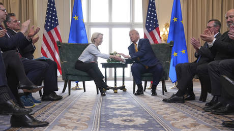 US President Donald Trump and European Commission President Ursula von der Leyen shake hands after reaching a trade deal at the Trump Turnberry golf course in Turnberry, Scotland, July 27, 2025.