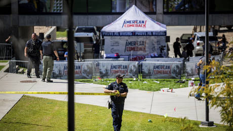 Law enforcement tapes off an area after Charlie Kirk was shot at the Utah Valley University, September 10, 2025