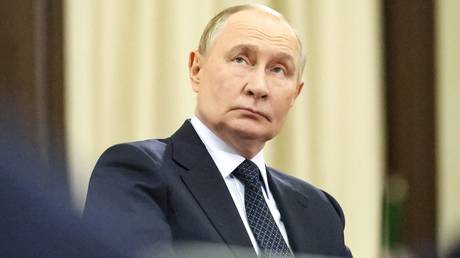 Russian President Vladimir Putin holds a meeting with the leaders of political party factions in the Russian State Duma.