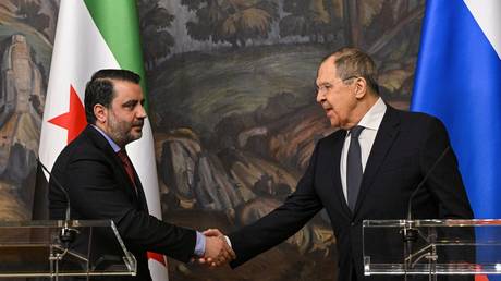 Syrian Foreign Minister Asaad al-Shibani (left) and Russian Foreign Minister Sergey Lavrov at a press conference following the meeting in Moscow, July 31, 2025.