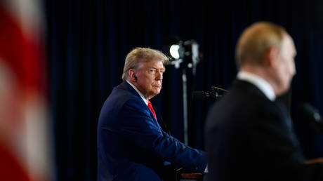FILE PHOTO: US President Donald Trump and Russian president Vladimir Putin participate in a joint press conference in Alaska, US, on August 15, 2025.