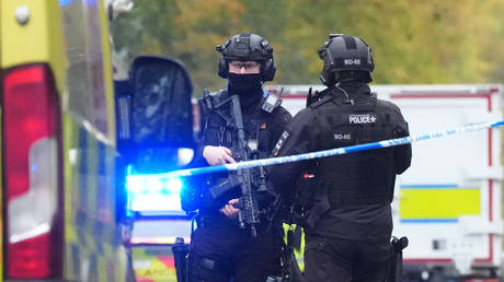 Armed police outside the Heaton Park Hebrew Congregation Synagogue, October 2, 2025, Crumpsall, Manchester, England.