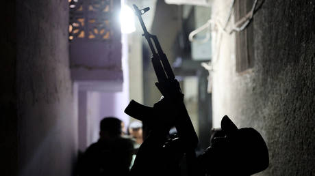 Members of the Syrian security forces carry out raids targeting hideouts of Assad government remnants in Aleppo, September 29, 2025.