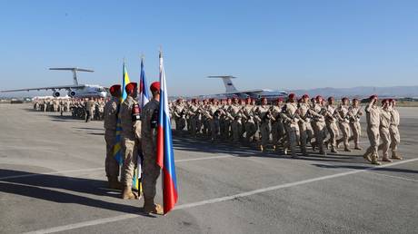 FILE PHOTO: Russian servicemen during the ceremony of welcoming Russian President Vladimir Putin at the Khmeimim Air Base in Syria.