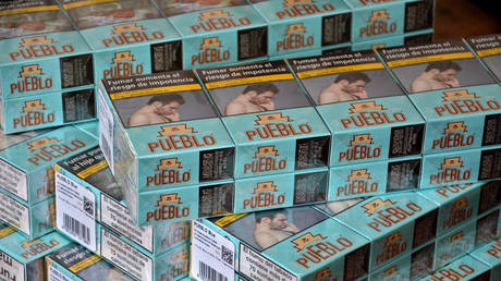 FILE PHOTO: Packs of Spanish cigarettes seen stacked on a table.