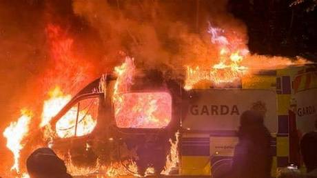 A burning police van in Dublin.