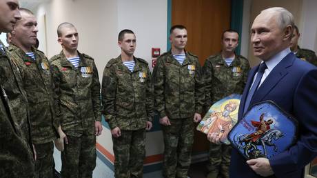 President Vladimir Putin visits a military hospital in Moscow, Russia on October 29, 2025.