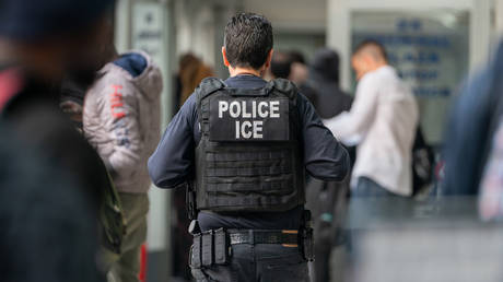 FILE PHOTO: An ICE agent near the Jacob K. Javits Federal Building, New York City, the US.
