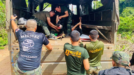 Two Thai soldiers injured by a landmine during a patrol near the Thai-Cambodia border are treated as they are to be transferred to a hospital in Sisaket province, Thailand, November 10, 2025.