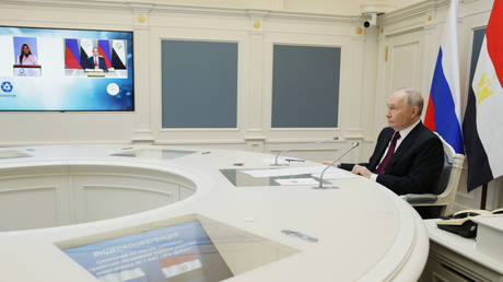 Russian President Vladimir Putin takes part in a ceremony to install the reactor vessel at the first power unit of the Egypt's El Dabaa Nuclear Power Plant via videoconference at the Kremlin in Moscow, Russia, on Wednesday, Nov. 19, 2025.
