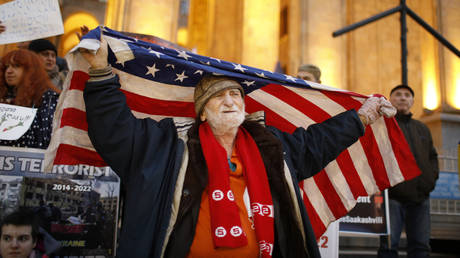 People gather to stage a demonstration against the bill on foreign influence transparency in Tbilisi, Georgia on March 9, 2023.