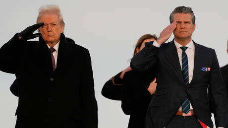 President Donald Trump and Defense Secretary Pete Hegseth at Dover Air Force Base, December 17, 2025.