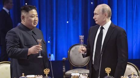 FILE PHOTO: Russian President Vladimir Putin and North Korean leader Kim Jong Un.