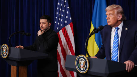 Vladimir Zelensky listens as US President Donald Trump speaks during a press conference following their meeting at Trump’s Mar-a-Lago club on December 28, 2025 in Palm Beach, Florida.