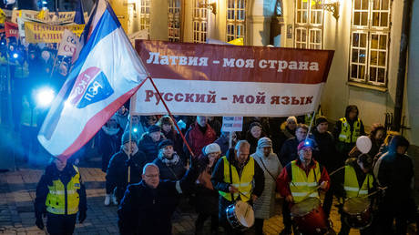 Participants attend a protest against a language reform in Riga, Latvia, on December 5, 2019.