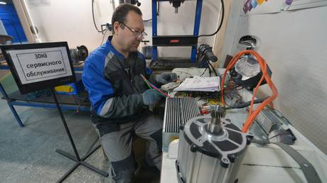 FILE PHOTO: A worker at the EcoGet small electric vehicle factory in Chelyabinsk, Russia, December 4, 2025.
