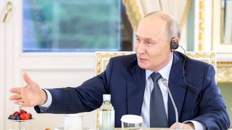 Russian President Vladimir Putin holds a meeting with heads of international news agencies as part of the St. Petersburg International Economic Forum (SPIEF) at the Constantine Palace in Strelna.