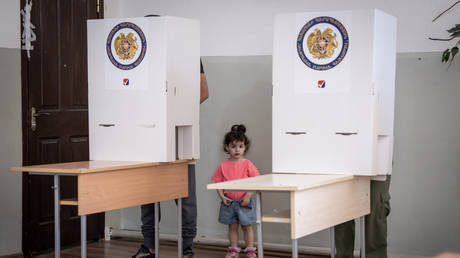 Voters cast their ballots during parliamentary elections in Yerevan, Armenia, on June 7, 2026.