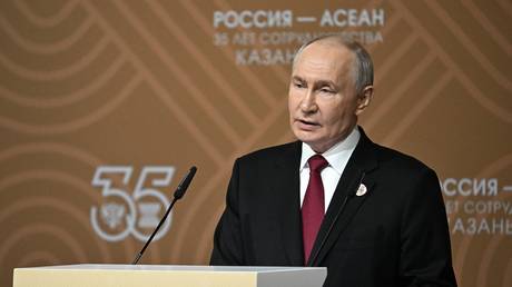 Russian President Vladimir Putin talks to reporters following day two of the Russia-ASEAN Summit in Kazan, Republic of Tatarstan, Russia.